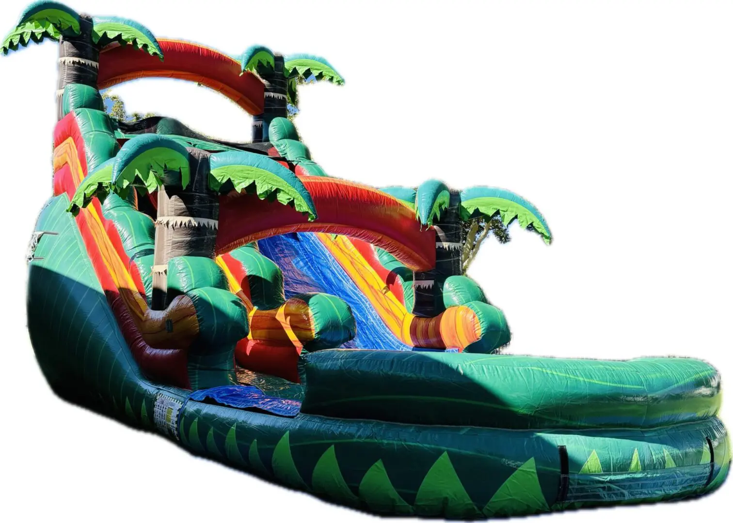 A large inflatable slide with palm trees on it.